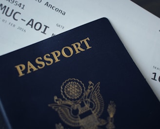passport booklet on top of white paper