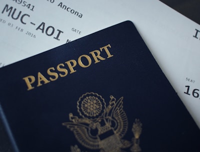 passport booklet on top of white paper